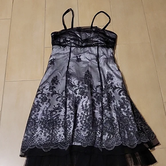 black dress with silver lining The Silver Lining Asymmetrical Dress Black/Silver / Large (10/12)